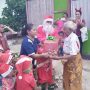 Penanaman Karakter Natal Anak TK Pniel Manulai II, Berbagi dengan Sesama